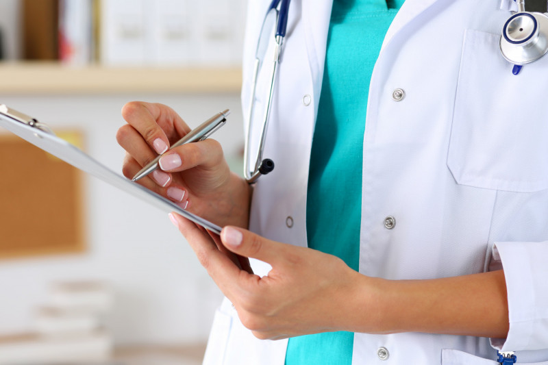 Generic stock image of a doctor holding a clipboard