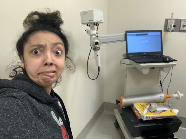 Nicole grimaces in the doctor's office before her pulmonary function test / Cystic Fibrosis News Today