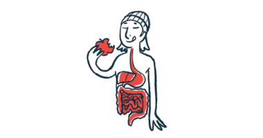 A person eats an apple to illustrate the human digestive system.