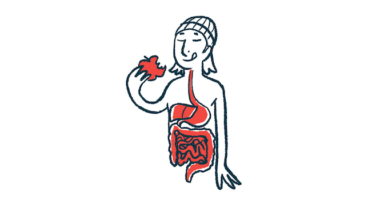 A person eats an apple to illustrate the human digestive system.