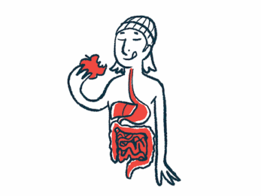 A person eats an apple to illustrate the human digestive system.
