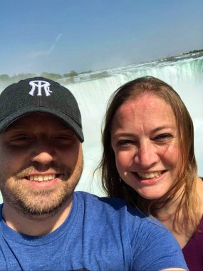double lung transplant | Cystic Fibrosis News Today | Shaun and Lara smile for a photo in front of Niagara Falls