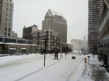 challenges of living with cystic fibrosis | Cystic Fibrosis News Today | A dark and gray urban landscape photo of Boston in the winter. The streets and buildings are covered in snow.