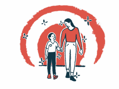 A mother and young son walk hand in hand in front of a rising sun.