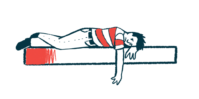 A person lies facedown on a bed with one arm hanging down.