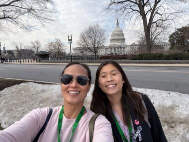 Nell Choi, right, and her mom, Maggie Kang, take a selfie with the U.S. Capitol in the background while in Washington, D.C., for Rare Disease Week. (Photo by Maggie Kang)
